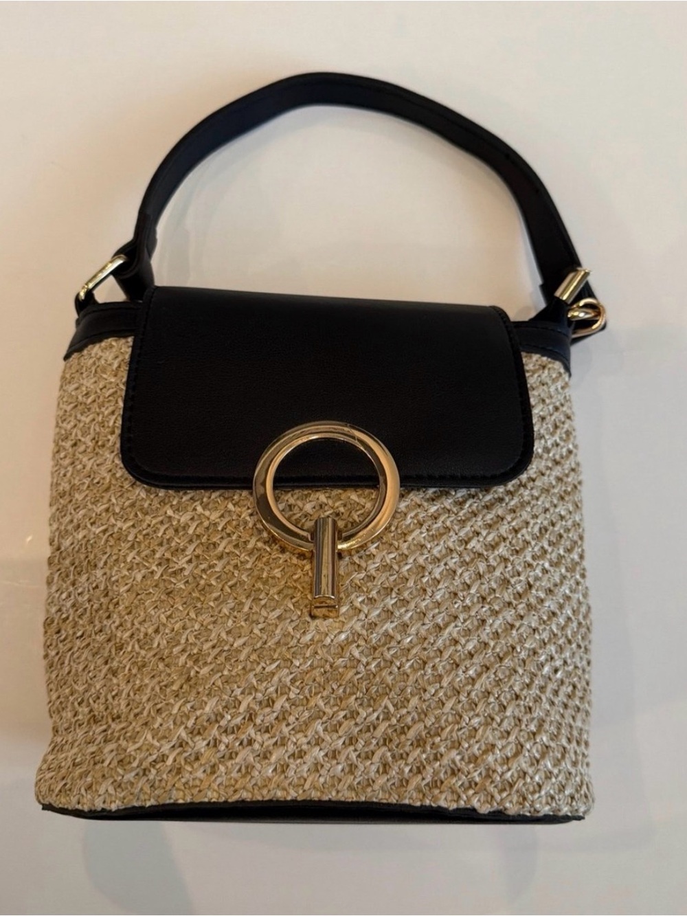 Woven Straw Bucket Bag with Black Leather Trim